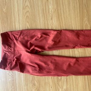 Lululemon Wunder Train high rise leggings with pockets in orange